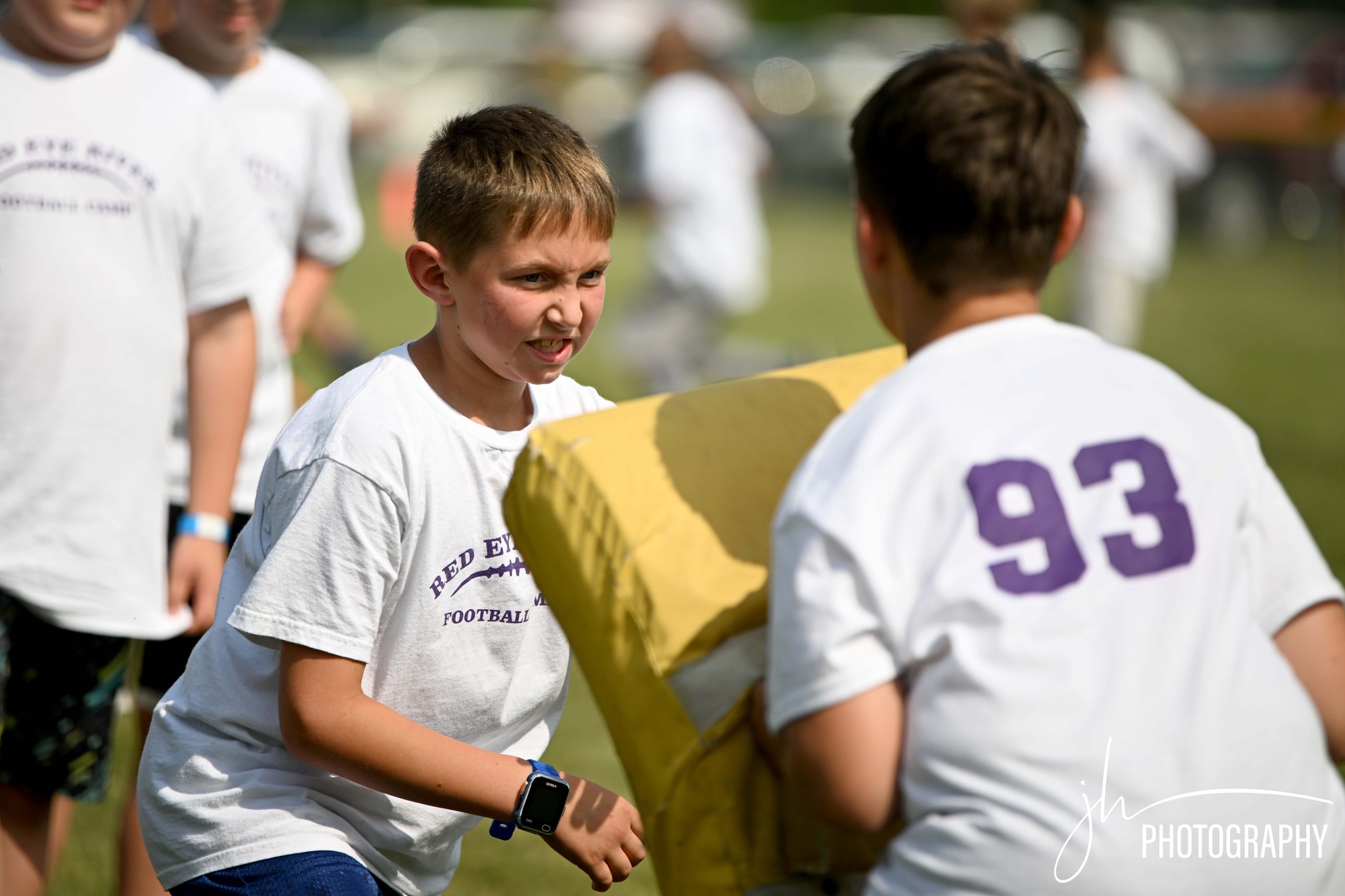 Athletes running a play together