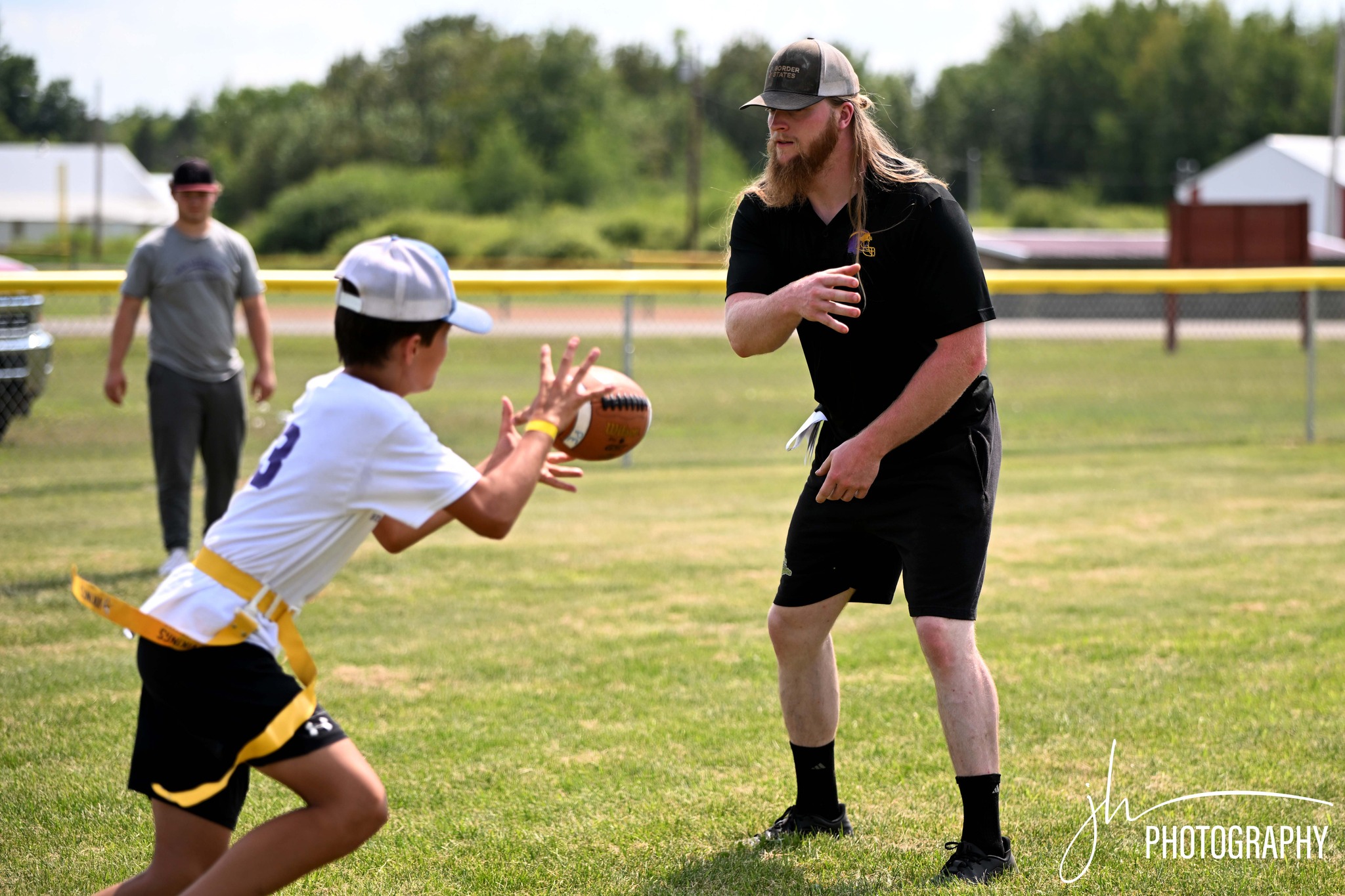 Camper receiving coaching feedback