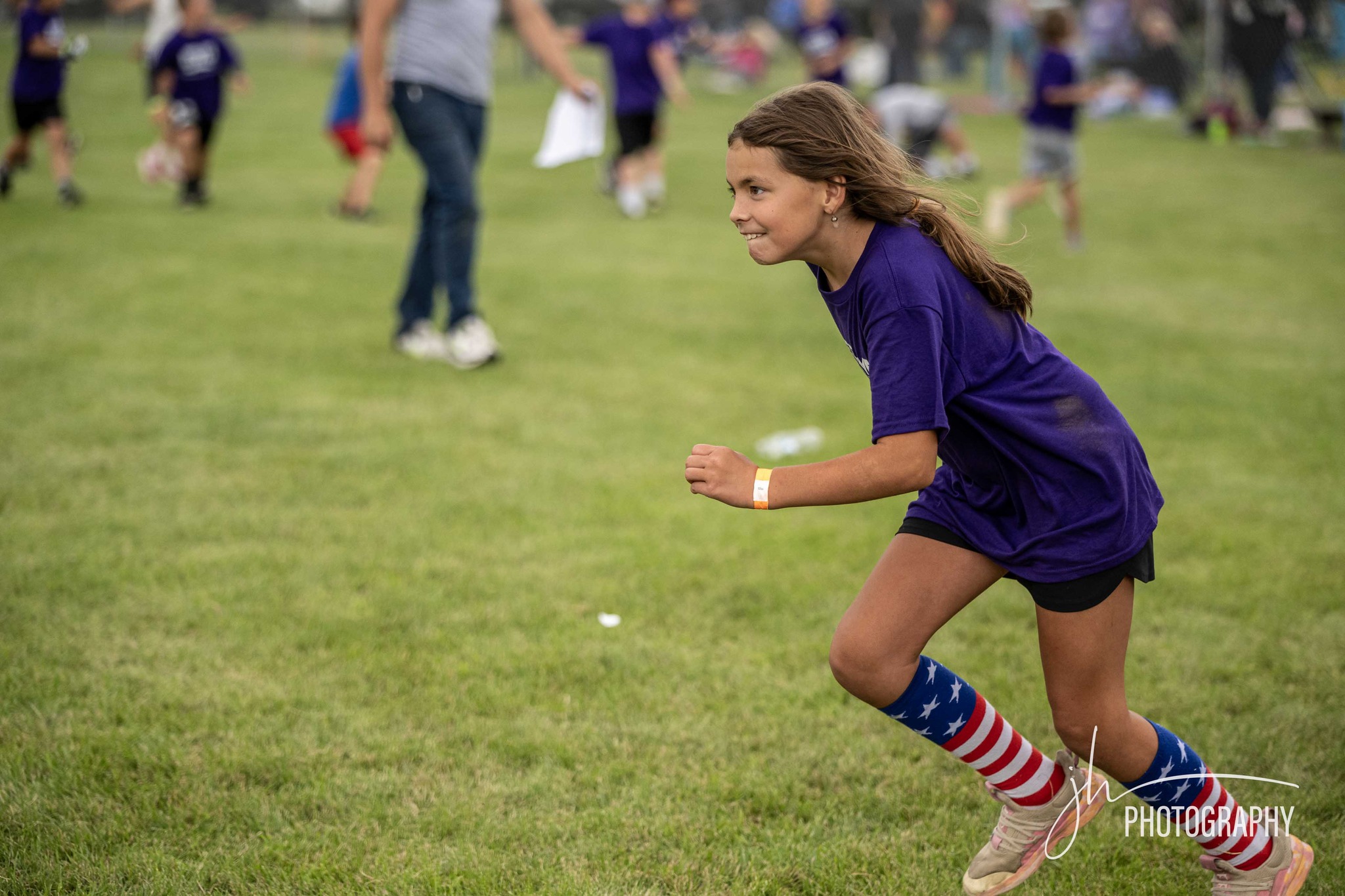 Campers working through drills on the field