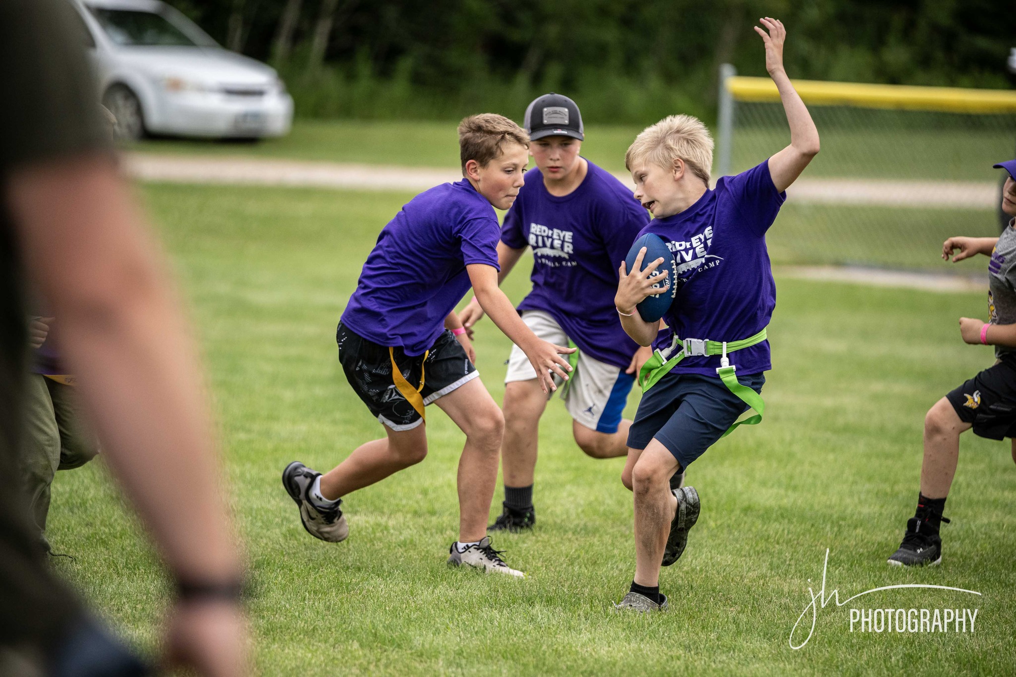 Campers cheering together on the sideline